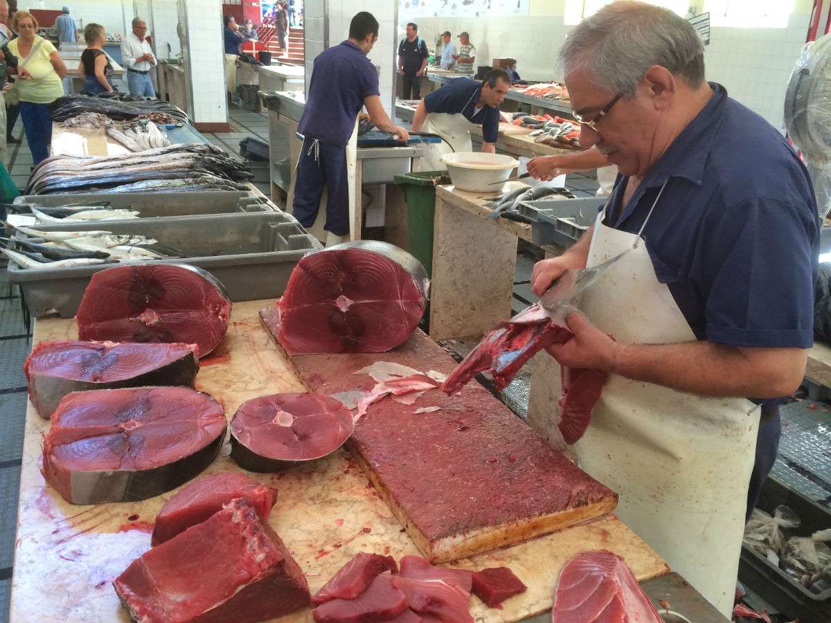 Market in Funchal, Madeira: tuna seller