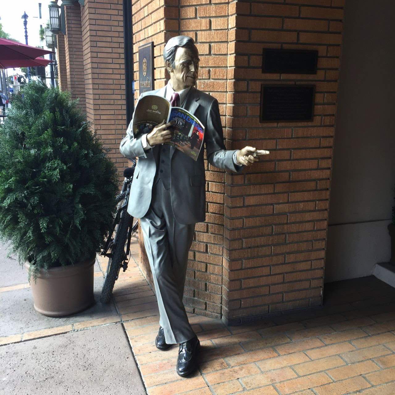 bronze statue That-a-Way by Seward Johnson at the entrance of The Sofia Hotel in San Diego